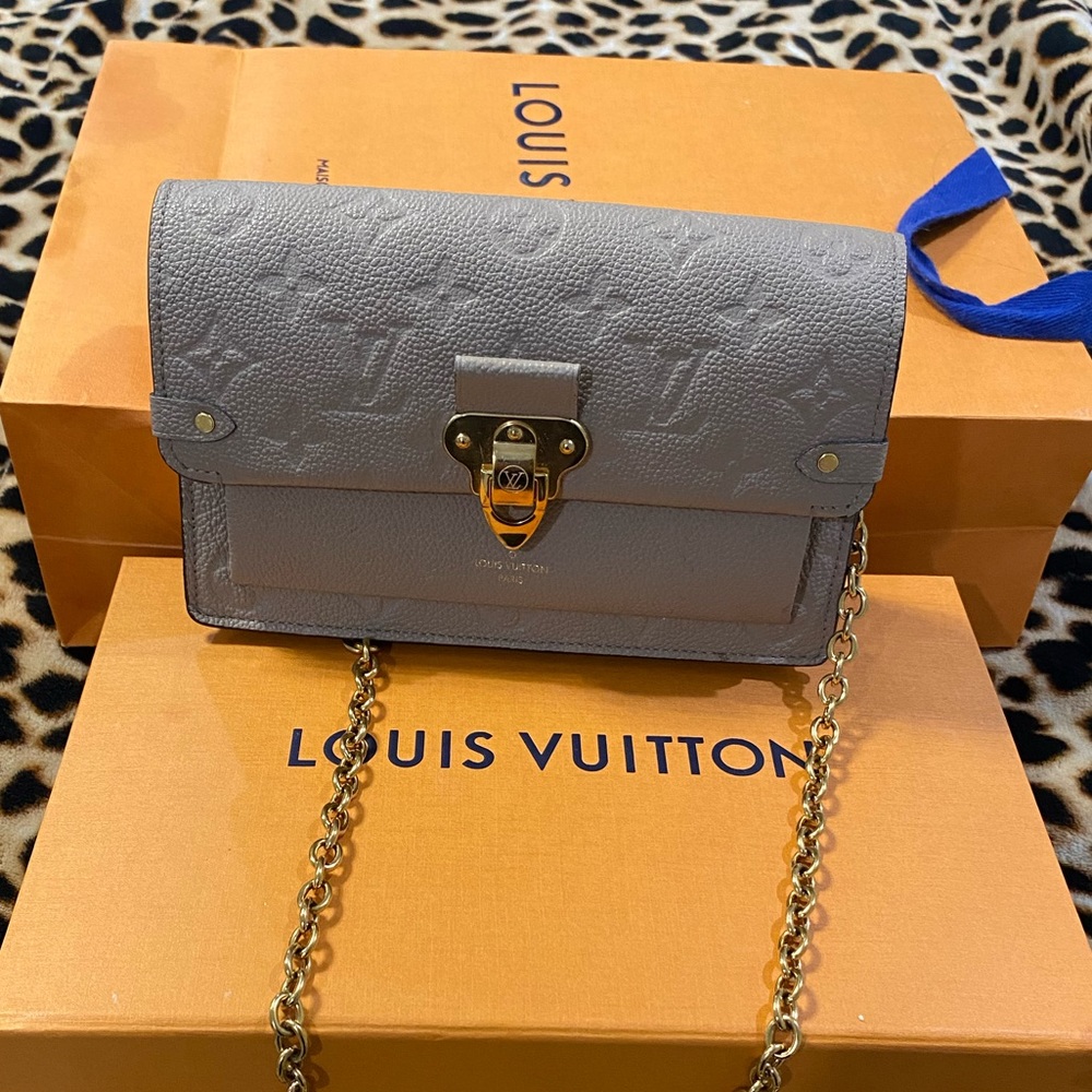 Louis Vuitton Vavin chain wallet
